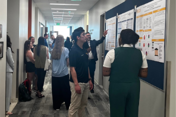Students presenting capstone projects