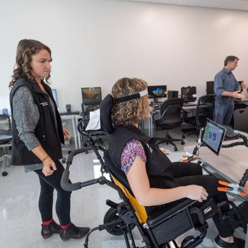 Student demonstrating assistive lab technology - by Tom Kojcsich at VCU Marketing